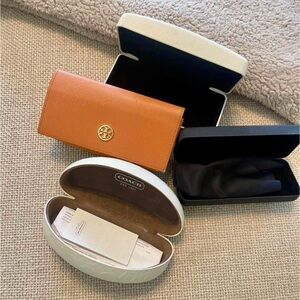 Gently used original designer sunglasses cases only.   good condition.
